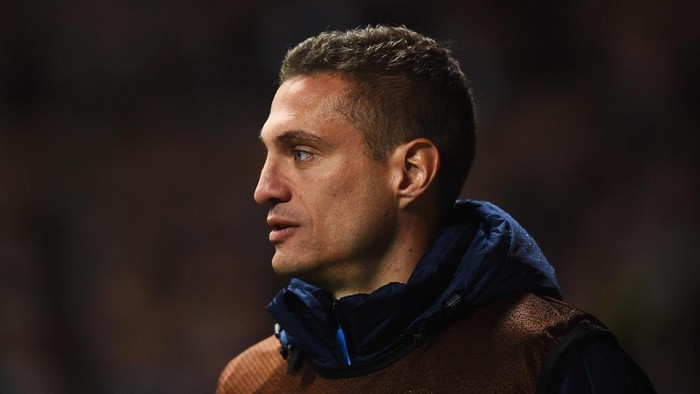 GLASGOW, SCOTLAND - FEBRUARY 19:  Substitute Nemanja Vidic of Inter Milan looks on during the UEFA Europa League Round of 32 first leg match between Celtic FC and FC Internazionale Milano at Celtic Park Stadium on February 19, 2015 in Glasgow, United Kingdom.  (Photo by Laurence Griffiths/Getty Images)