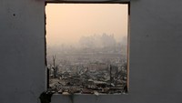 Ratusan rumah jadi korban kebakaran. REUTERS/Pablo Sanhueza.