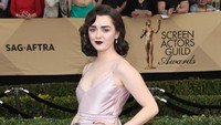 Bintang Game of Thrones, Maisie Williams tampil menawan dengan gaun  berwarna pink. Frazer Harrison/Getty Images/detikFoto.