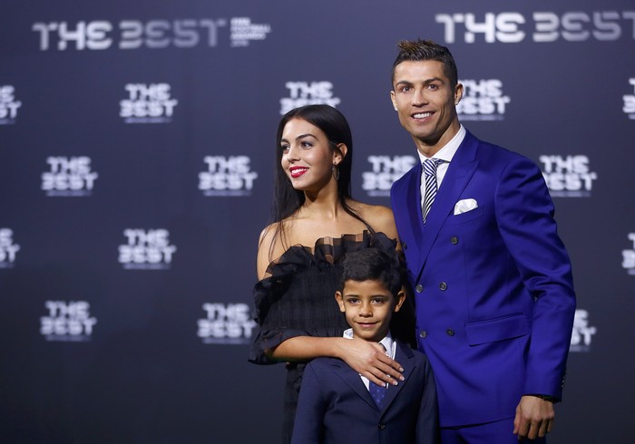 REFILE - ADDITIONAL CAPTION INFORMATION  Football Soccer - FIFA Awards Ceremony - Zurich, Switzerland - 09/01/17.  Real Madrids Cristiano Ronaldo, his son Cristiano Ronaldo Jr and Georgina Rodriguez arrive at the ceremony.  REUTERS/Arnd Wiegmann