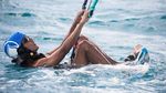 Bermain Kitesurfing di Karibia, Obama Semringah Banget