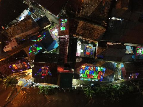 Cantik! Mural Pesan Anti-rokok di Atap Rumah Warga Kali Code