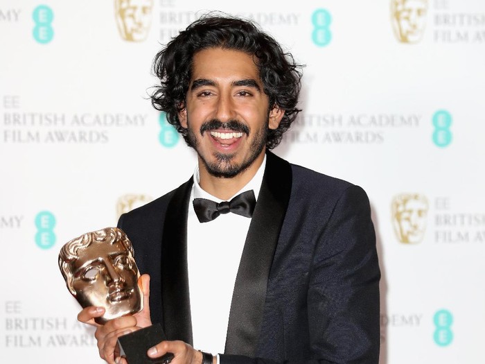 LONDON, ENGLAND - FEBRUARY 12:  Supporting Actor winner Dev Patel poses with his award in the winners room during the 70th EE British Academy Film Awards (BAFTA) at Royal Albert Hall on February 12, 2017 in London, England.  (Photo by Chris Jackson/Getty Images)