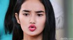 Bibir Merah Faby Marcelia