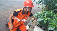 Ini Dadang, Pasukan Oranye yang Menyelam ke Got Hitam Jakarta