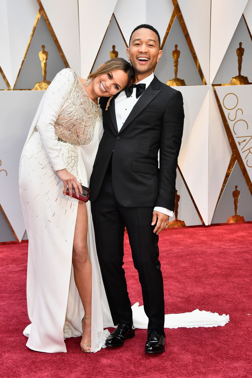 HOLLYWOOD, CA - FEBRUARY 26:  Model Chrissy Teigen (L) and singer John Legend attend the 89th Annual Academy Awards at Hollywood & Highland Center on February 26, 2017 in Hollywood, California.  (Photo by Frazer Harrison/Getty Images)