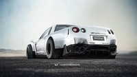 Bahan yang dilakukan pada Nissan GT-R. Si desainernya mengadopsi body kit yang lebih lebar, diffuser belakang yang besar.
