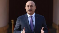 Turki melalui Menteri Luar Negeri Mevlut Cavusoglu juga menuding AS melanggar hukum internasional. Kami mengecam pernyataan pemerintah AS yang tidak bertanggung jawab. Keputusan itu bertentangan dengan hukum internasional dan resolusi PBB yang relevan, ujarnya. (Yiannis Kourtoglou/Reuters)
