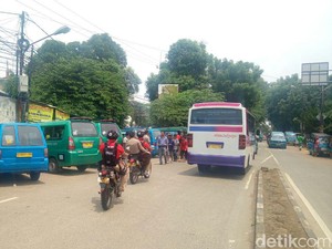 Polisi Depok Siaga di Jalanan Antisipasi Sweeping Ojek Online