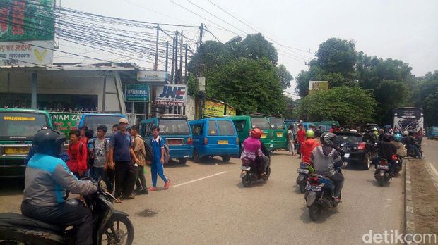 Polisi Depok Siaga di Jalanan Antisipasi Sweeping Ojek Online