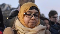 Seorang musliman mengikuti aksi ini. REUTERS/Hannah McKay.