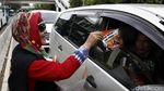Badut Monas Sosialisasikan Pilgub DKI Putaran Kedua