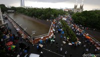 Hujan tak menyurutkan langkah peserta aksi 313.
