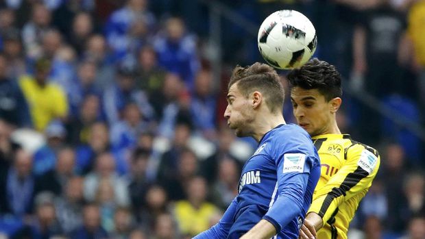 Marc Bartra (kanan) sempat mengalami trauma pascaledakan bus Borussia Dortmund.