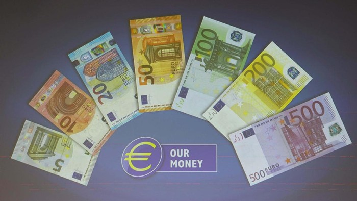 A journalist takes a picture of the new 50 Euro banknote with a mobile phone during the presentation of the new bill at the European Central Bank (ECB) headquarters in Frankfurt April 4, 2017. REUTERS/Kai Pfaffenbach