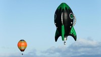 Salah satu yang unik adalah balon raksasa berbentuk seperti roket bernama Alien Rocket. Hagen Hopkins/Getty Images.
