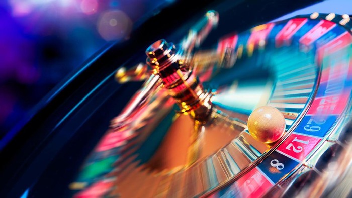 high contrast image of casino roulette in motion