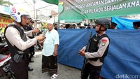 Polisi menjaga ketat TPS ini.
