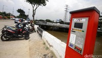 Terminal parkir terpadu elektrik (PTE) di Kalijodo akan diganti dengan sistem gerbang parkir (gate).