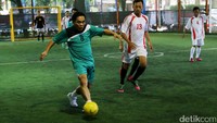 Salah satu tim saat berkompetisi di pertandingan futsal.
