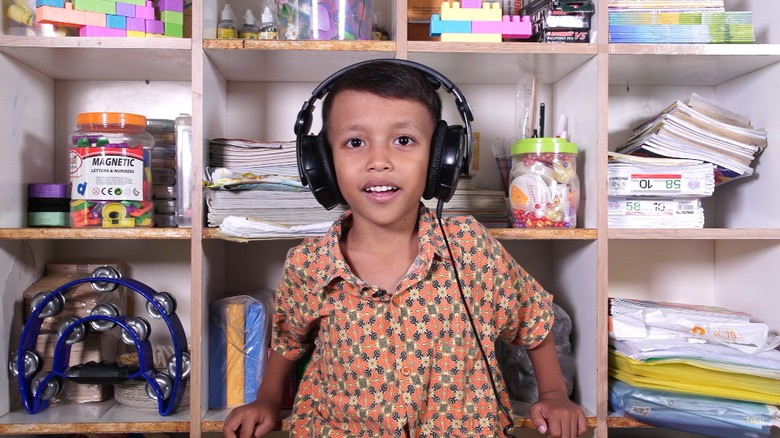 Ilustrasi anak mendengarkan lagu. Foto: 20detik Ilustrasi anak mendengarkan lagu. Foto: 20detik