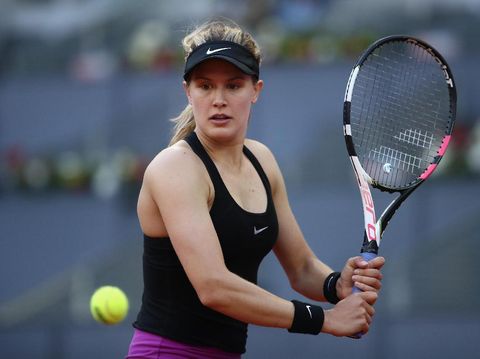 MADRID, SPAIN - MAY 08:  Winner in three sets Eugenie Bouchard of Canada shakes hands with Maria Sharapova of Russia during day three of the Mutua Madrid Open tennis at La Caja Magica on May 8, 2017 in Madrid, Spain.  (Photo by Julian Finney/Getty Images)