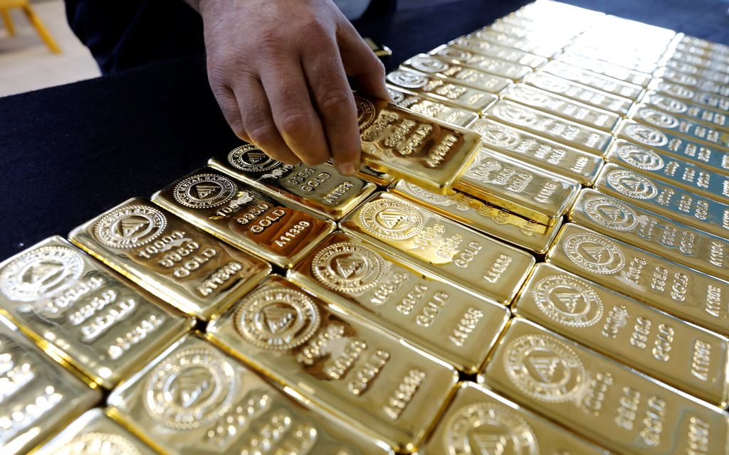 A woman checks products in a gold and jewellery store in the central Anatolian city of Corum, Turkey, May 11, 2017. Picture taken May 11, 2017. REUTERS/Umit Bektas