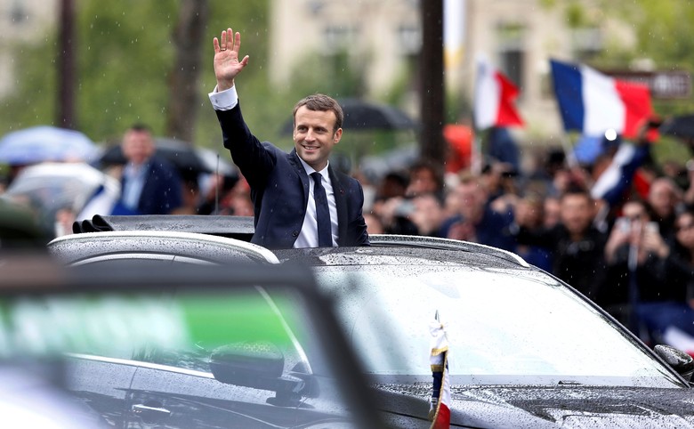 Emmanuel Macron French President Emmanuel Macron looks out from his car as he leaves the Hotel de Ville in Paris, France, May 14, 2017. REUTERS/Francois Lenoir