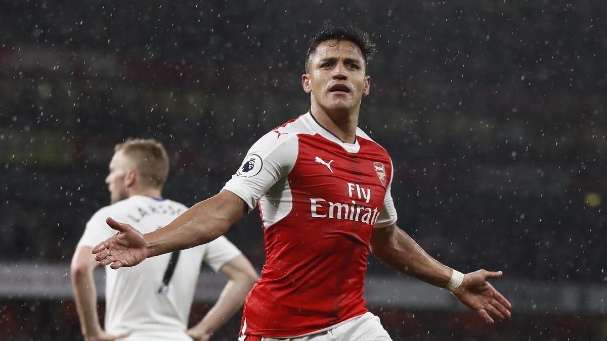 Alexis Sanchez tetap di Arsenal pada musim depan. Foto: Reuters