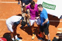 Rafael Nadal lolos setelah Nicolas Almagro mundur karena cedera
