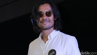 Paras tampannya serta tubuh tegapnya menjadi salah satu dari daya tariknya. Pool/Hanif Hawari/detikFoto.