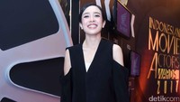 Senyum manisnya kala berpose di depan kamera. Pool/Noel/detikFoto.
