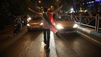 Jalanan Tehran dipenuhi pendukung Rouhani untuk merayakan kemenangan Pilpres. (TIMA/Reuters)