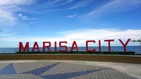 Terakhir, kamu juga bisa berfoto dengan papan nama kekinian Kota Marisa. Marisa adalah nama ibukota Kabupaten Pohuwato. Jangan sampai terlewat kalau liburan ke sini (Wahyu/detikTravel)