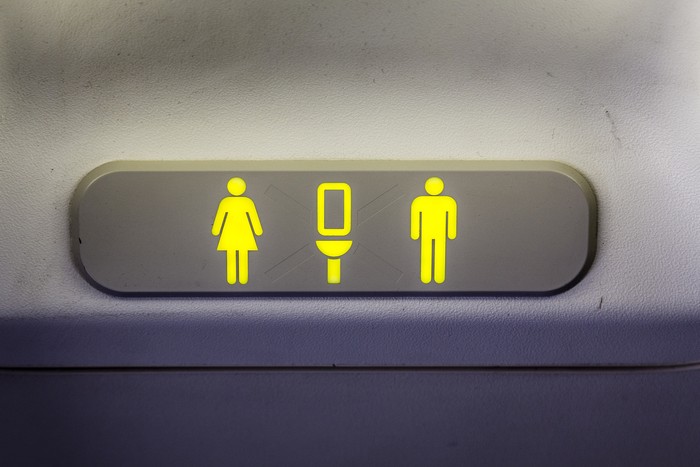 Ilustrasi tanda toilet di pesawat