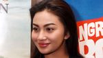 Senyuman Menggoda Ariel Tatum