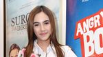 Manisnya Senyuman Syahra Larez