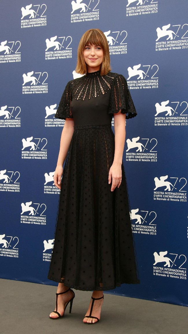 Dakota Johnson attends a photocall for Black Mass during the 72nd Venice Film Festival at Palazzo del Casino on September 4, 2015 in Venice, Italy.  (Photo by Vittorio Zunino Celotto/Getty Images)
