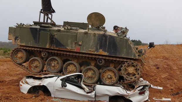 Car Crushing (Facebook/Tank Town USA)