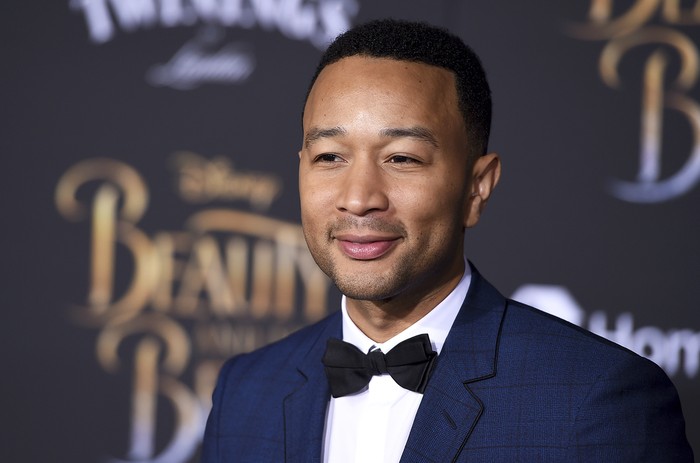 John Legend arrives at the world premiere of 