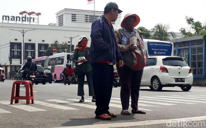 Jasa Penukaran Uang Receh Telah Menjamur