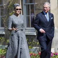 Prince Charles, Prince of Wales (R) and Her Highness Sheikha Mozah bint Nasser Al Missned, Chairperson of Qatar Foundation for Education, Science and Community Development, attend the official opening of the Quranic Garden Exhibition at the Royal Botanic Gardens on April 8, 2010 in Surrey, England.  (Photo by Arthur Edwards/WPA Pool/Getty Images)