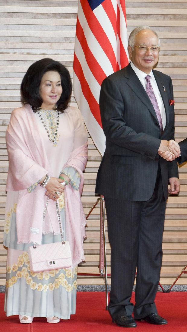 TOKYO, JAPAN - APRIL 19: Prime Minister of Malaysia Dato' Sri Mohd Najib (2nd L) shakes hands with Japanese Prime Minister Yukio Hatoyama, as their respective wive's Miyuki Hatoyama (R), and Datin Sri Rosmah Mansor (L) stand by their sides at the premier's official residence in Tokyo, Japan, 19 April 2010. Prime Minister Dato' Sri Mohd Najib and his wife are in Japan from April 18 to  21. (Photo by Toshifumi Kitamura-Pool/Getty Images)
