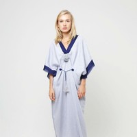 Brand lokal lain yang menawarkan kaftan kasual atraktif adalah Douche. Kaftan itu tampak sylish dengan aksen rumbai dan tassel. Apalagi warnanya tidak terlalu mencolok atau monoton. Foto: Bobobobo