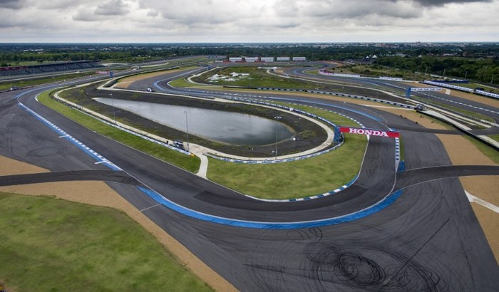 This photo taken on May 17, 2017 shows an overview of the Chang International Circuit, Thailands first FIA Grade 1 approved motorsport race track, in the northeastern Thai province of Buriram.
A godfather of Thai politics is using cash and contacts to transform his once poor, forgotten rice-farming fiefdom into an unlikely sporting Camelot, complete with a football stadium and racetrack set to host the MotoGP. / AFP PHOTO / Lillian SUWANRUMPHA / TO GO WITH Thailand-politics-economy-sport, FEATURE by Sally Mairs