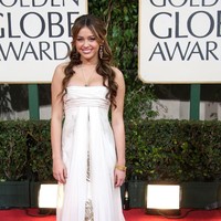 Miley Cyrus arrives at the 66th Annual Golden Globe Awards held at the Beverly Hilton Hotel on January 11, 2009 in Beverly Hills, California.  (Photo by Frazer Harrison/Getty Images)