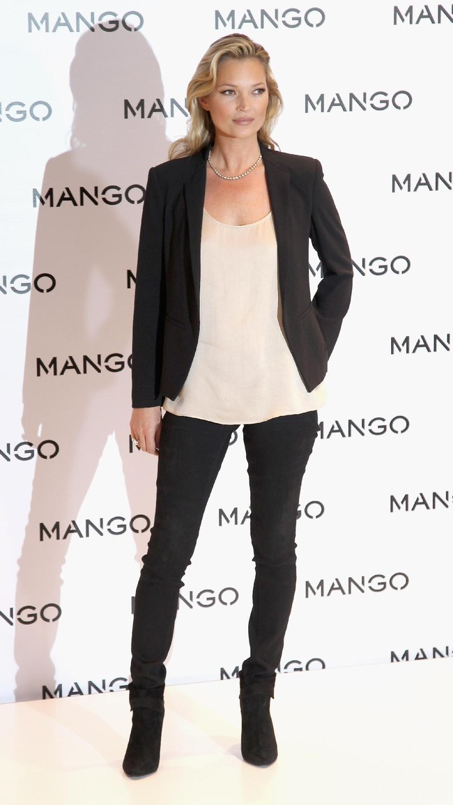 Kate Moss poses for photographs at the Mango Store Oxford Street on January 24, 2012 in London, England. Kate Moss was today launched as the new face of the fashion brand.  (Photo by Chris Jackson/Getty Images)