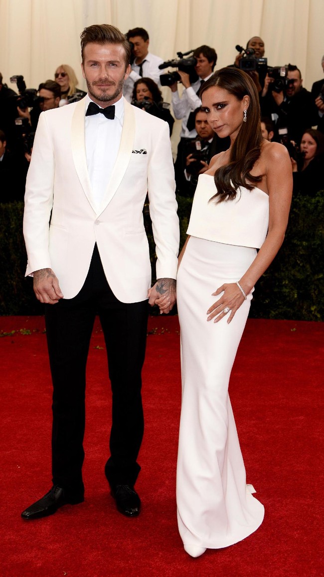 David Beckham and Victoria Beckham attend the Charles James: Beyond Fashion Costume Institute Gala at the Metropolitan Museum of Art on May 5, 2014 in New York City.  (Photo by Dimitrios Kambouris/Getty Images)