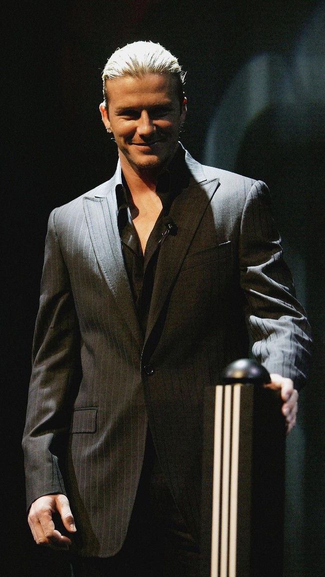 David Beckham officially unveils his personal logo at the adidas global headquarters on March 3, 2004 in Herzogenaurach, Germany.  (Photo by Gary M.Prior/adidas via Getty Images)