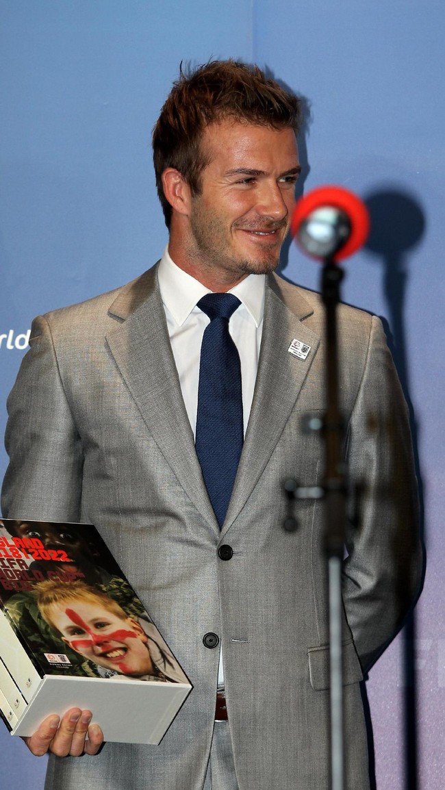 David Beckham, England 2018 Vice President prepares to hand over the Bid book to Sepp Blatter, President of FIFA during the 2018/2022 World Cup Bid Book Handover ceremony at FIFA Headquarters  on May 14, 2010 in Zurich, Switzerland.  (Photo by Ross Kinnaird/Getty Images)